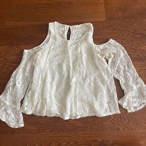 Long sleeve blouse with shoulder cut offs